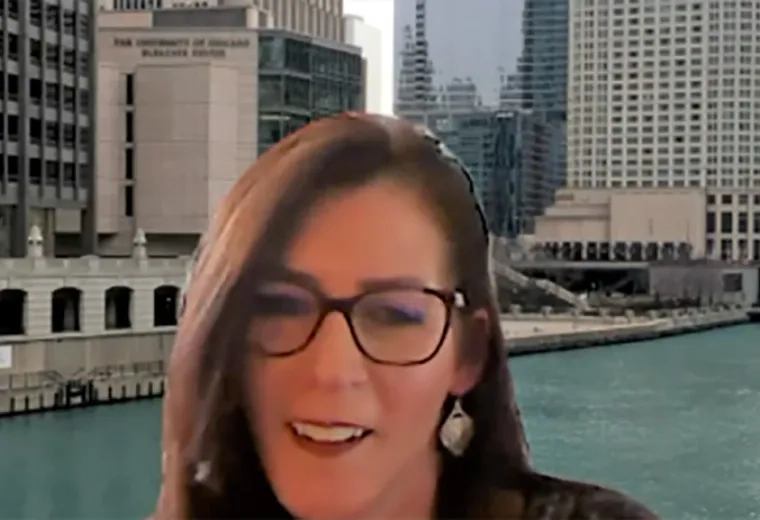 Photo of PT Professor Prue Plummer with the Navy Yard as back drop