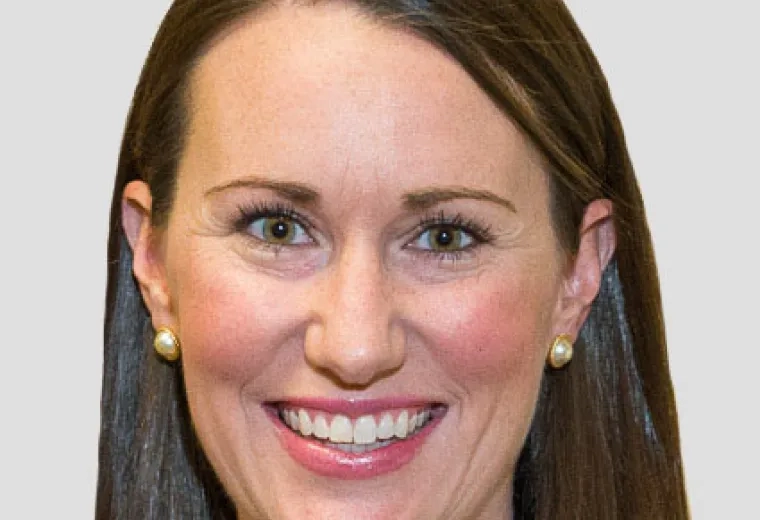 Professional headshot of an MGH IHP Doctor of Speech-Language Pathology program faculty member with a studio background.