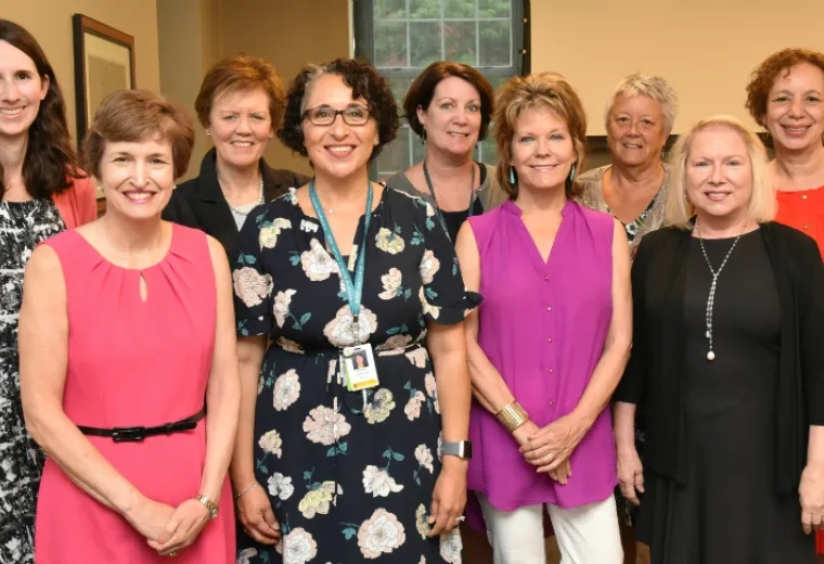 group of women smile for the camera
