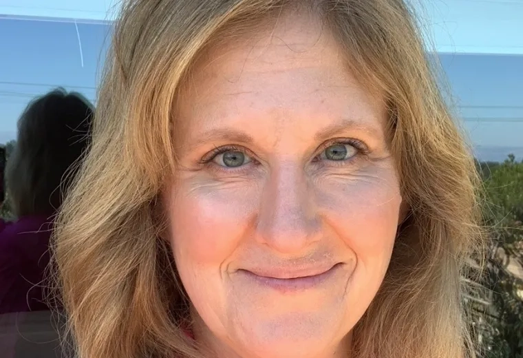 Carrie Mclean in pink shirt