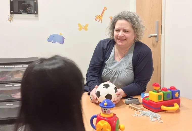 woman talking to a child