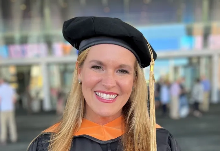 Woman in cap and gown