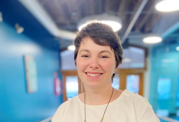 Kelly Spellman in white shirt