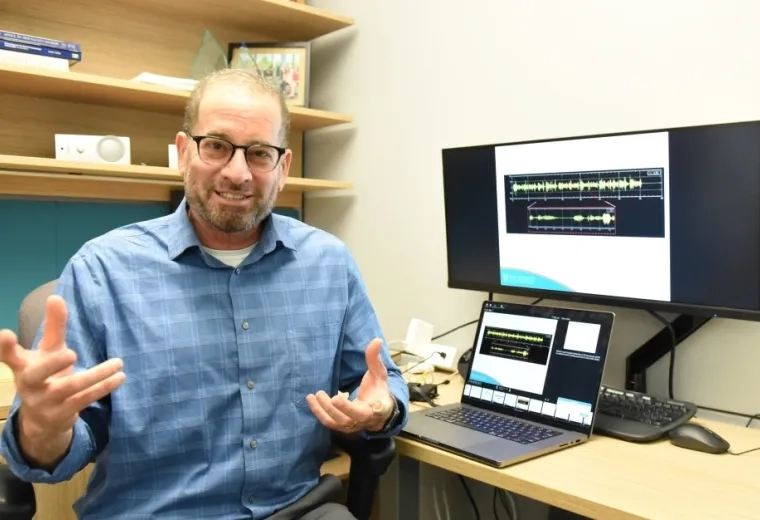 Man gesturing in an office