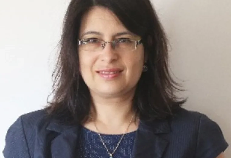 Anna Zisberg in blue top