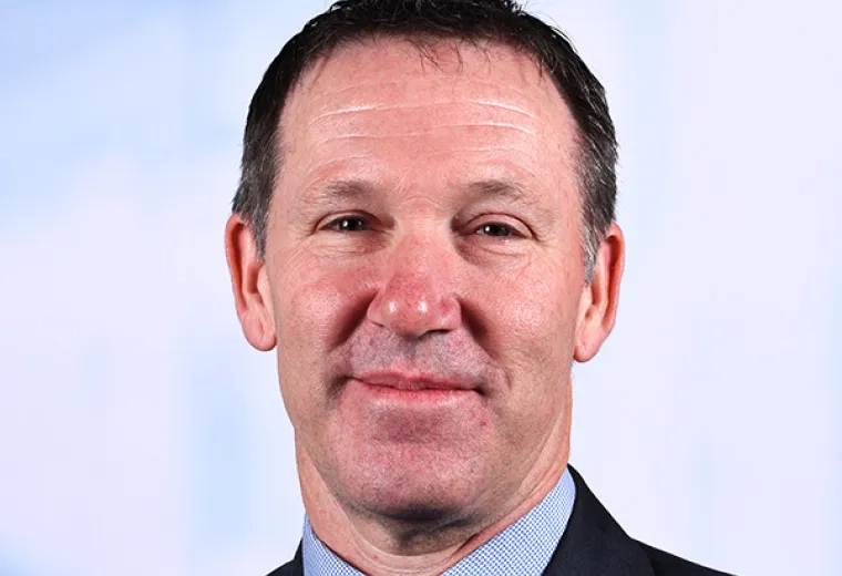 doug has a suit and tie on