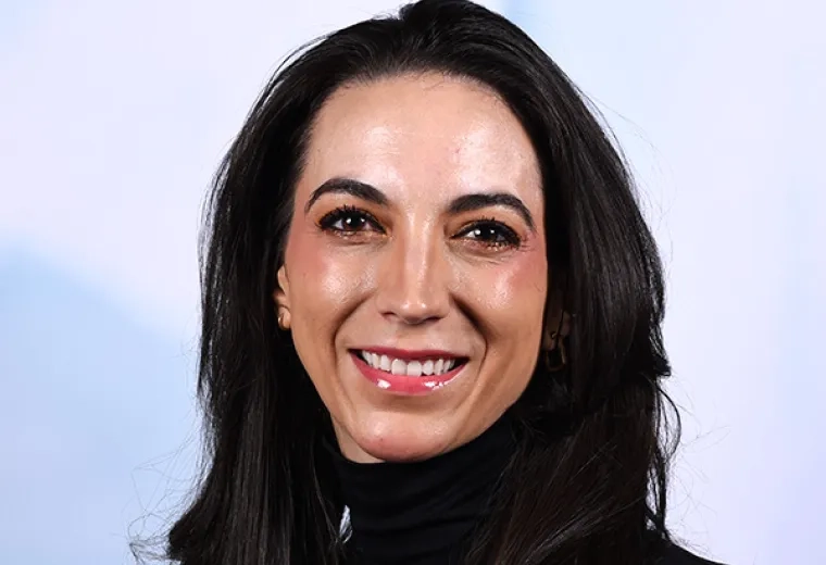 annie has dark hair and wears pink lip gloss