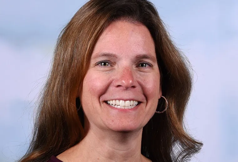 kathy has reddish brown hair