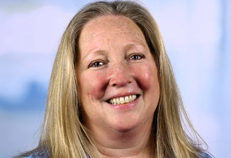 kristen has blonde hair and freckles 