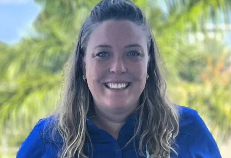 Lindsay Sundberg in blue shirt