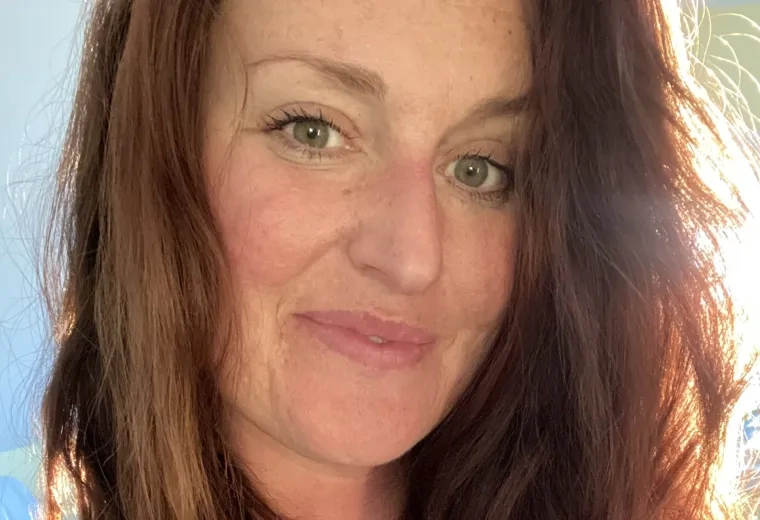 light shines in back of norma and through her hair