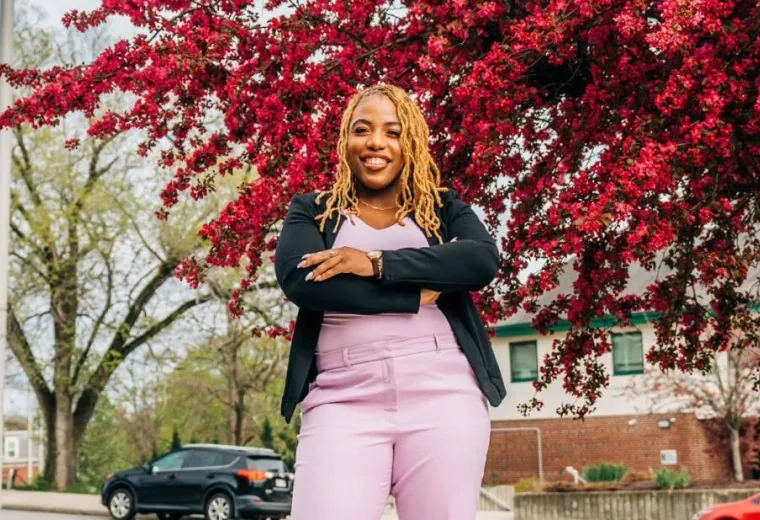 Woman standing and smiling