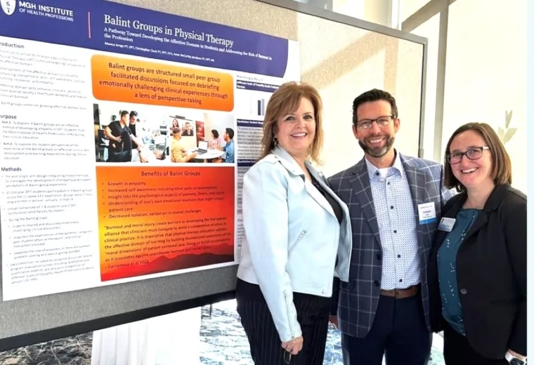 People in front of research poster