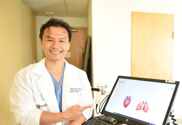 Man pointing at laptop