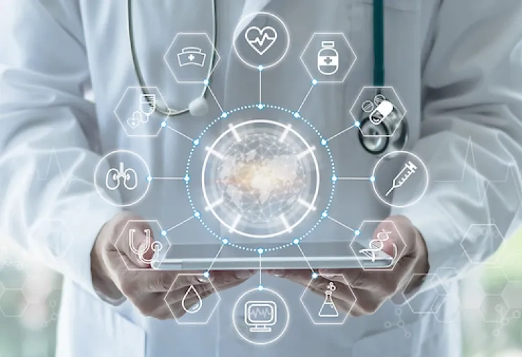 icons representing healthcare like pill bottles and hearts are in a circle around a photo of hands holding a tablet