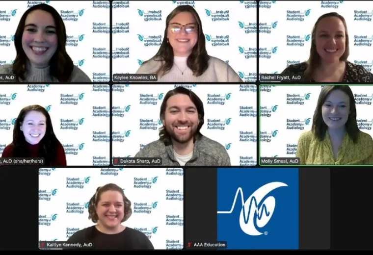 seven individuals on zoom screen