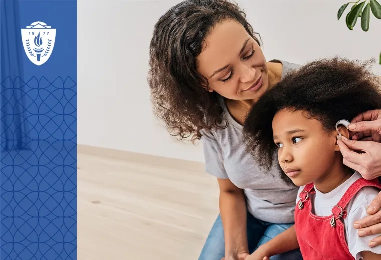 woman has arm around her daughter who is getting fitted for a hearing aid