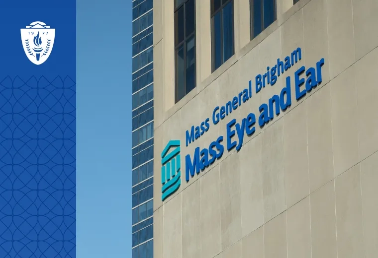 A pale concrete building with the Mass General Brigham logo and words mass eye and ear on the side.