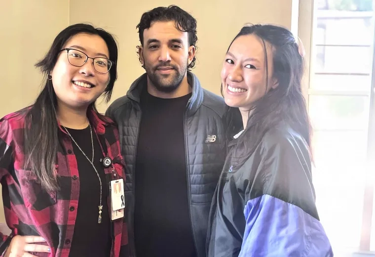 Doctor of Occupational Therapy students posing together during a group activity, showcasing camaraderie and teamwork.
