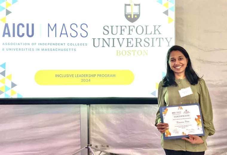 Woman smiling with an award
