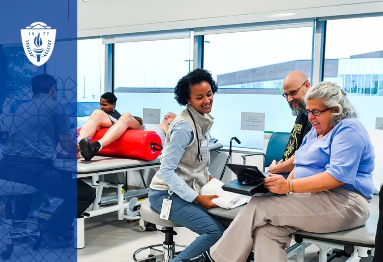 professor surrounded by students in a gym