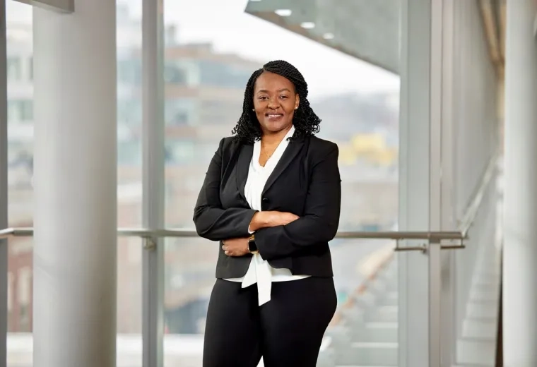 Confident professional in a suit representing leadership in speech language pathology