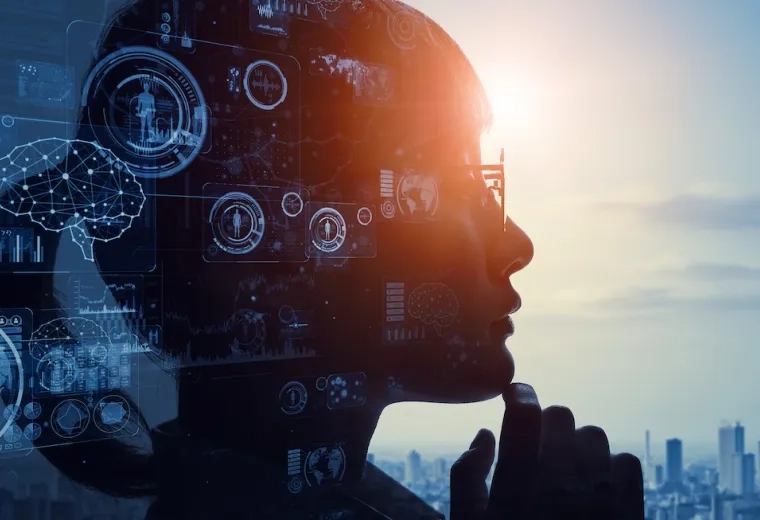 silhouette of a head with digital graphics behind it