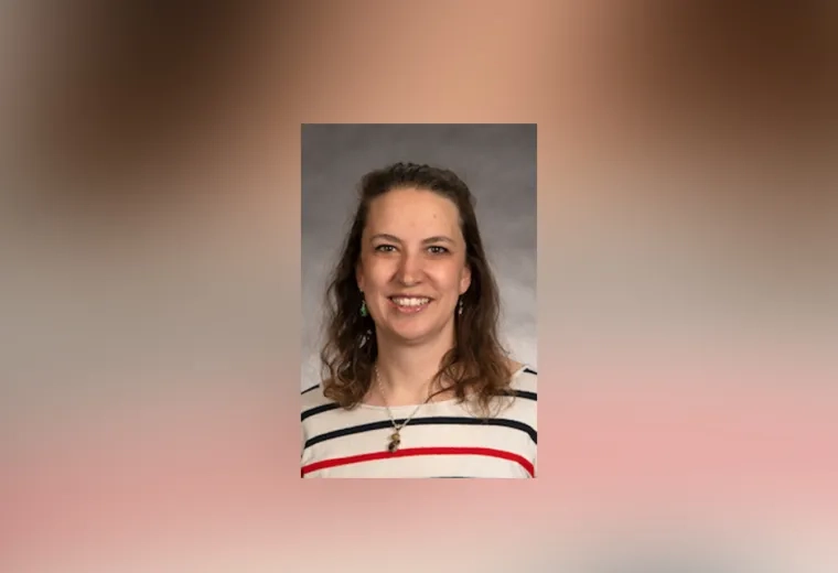 smiling woman in a striped top