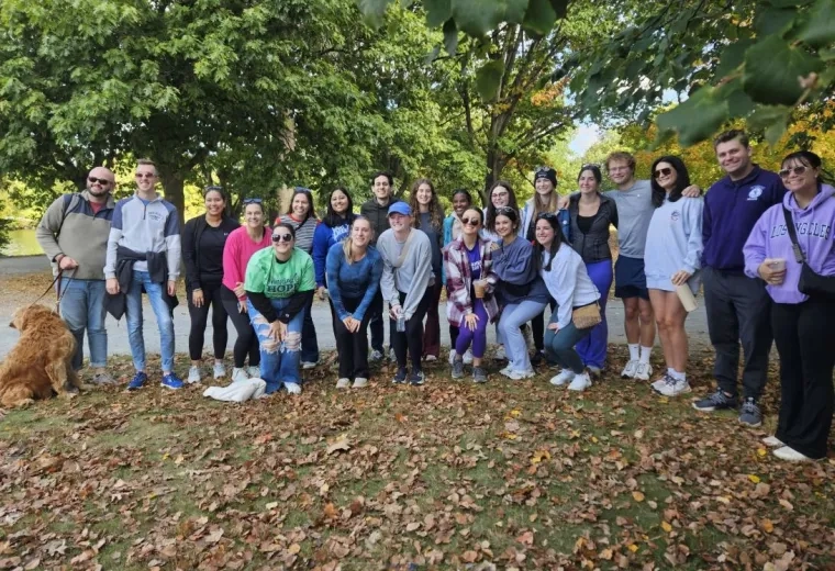 group photo in front of trees
