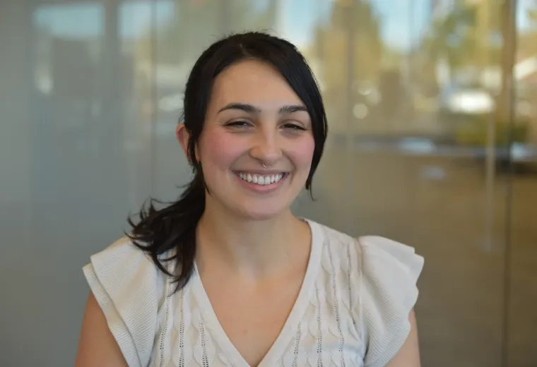 eliana in a white top