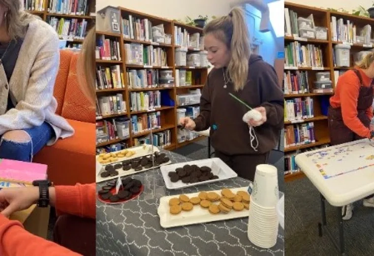 Students doing crafts and eating cookies