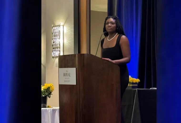 Woman standing at a podium