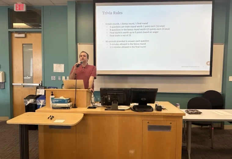 Man in front of screen