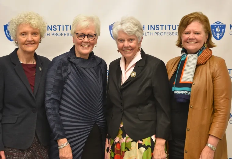 A photo of four women