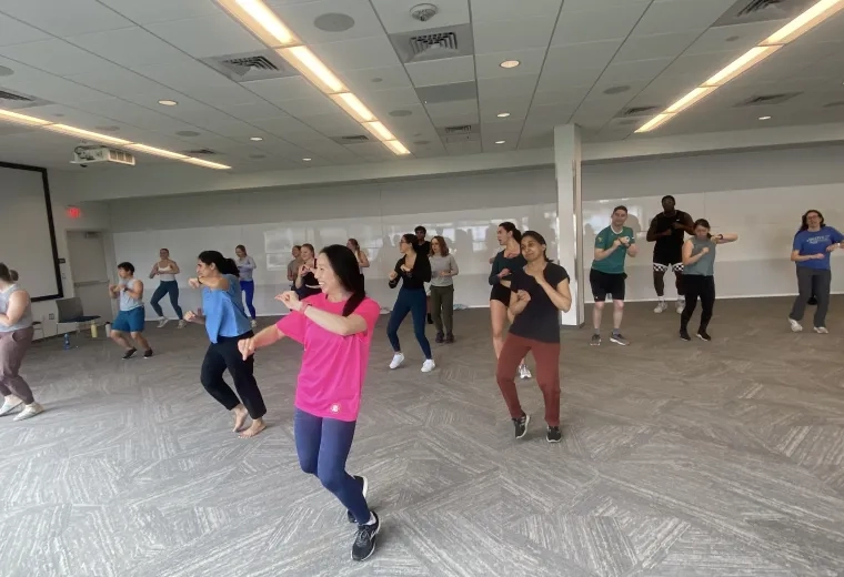 Woman leading dance class 
