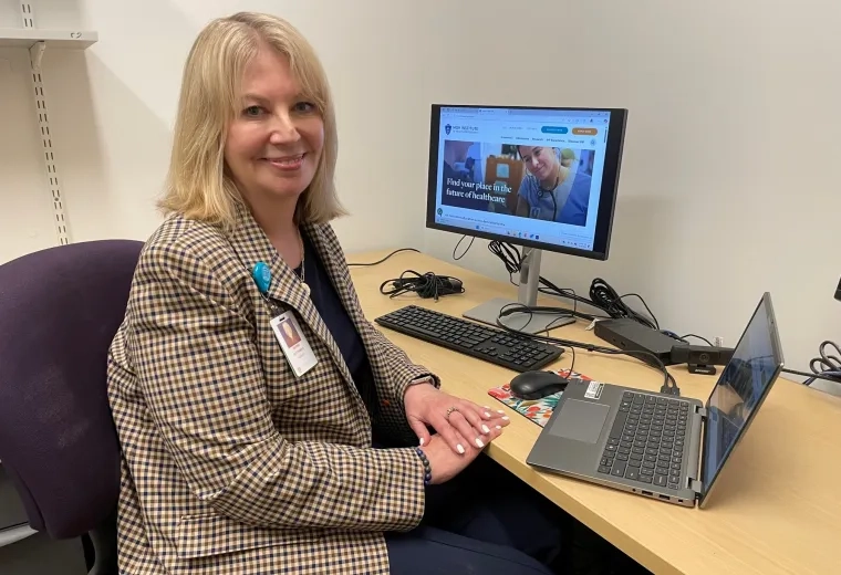 woman sitting at desk 