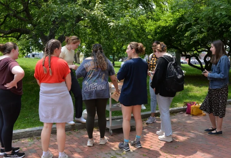 A photo of people gathered at an event outdoors