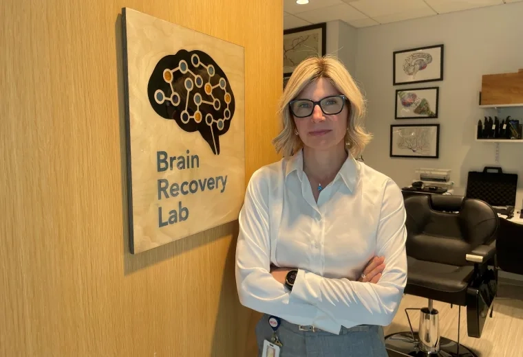 woman standing by door 