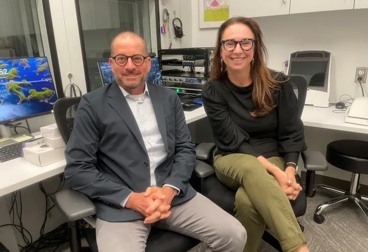 man and woman sitting 