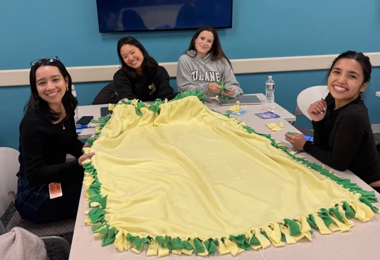 four students at table 