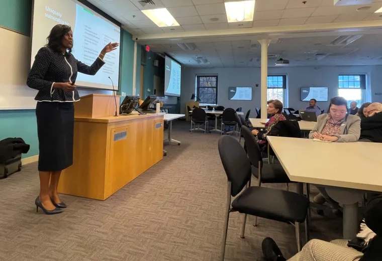 Woman talking to group 