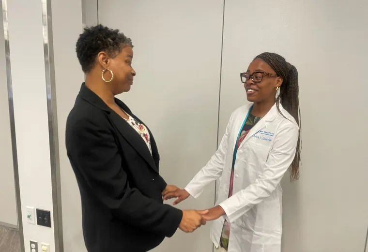 mom and daughter holding hands 