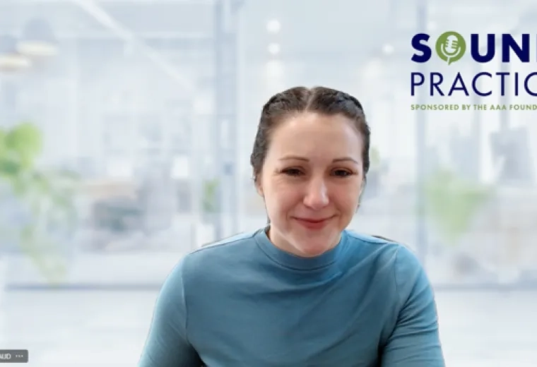 woman in front of a clear screen