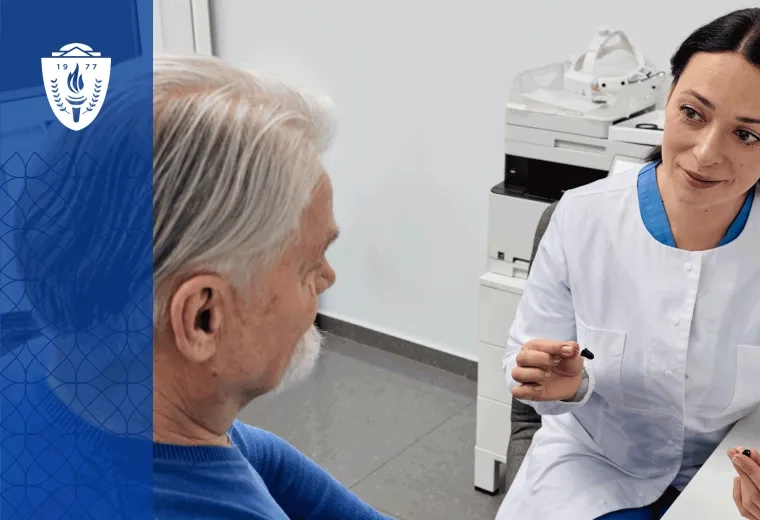 Audiology assistant explaining hearing aid features to an older adult patient