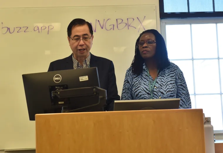 man and woman at podium 