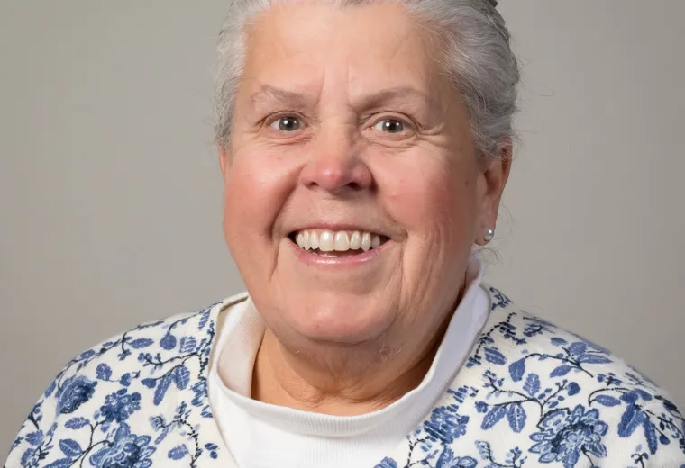 Professional headshot of an MGH IHP Doctor of Physical Therapy program faculty member with a studio background
