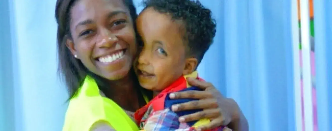 OTD student Bria Mitchell-Gillespie with a client in Jordan.