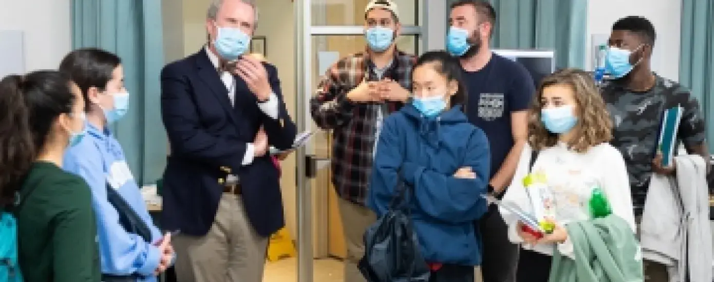 School of Nursing Dean Dr. Kenneth R. White, third from left, talks with students from the University of Richmond during their tour of the IHP campus.