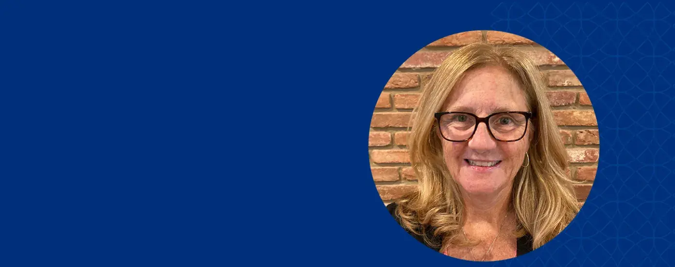 profile photo of ann she wears black rimmed glasses