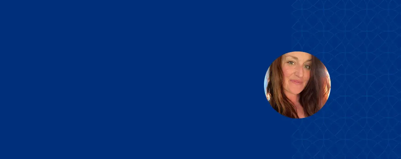 close up photo of norma the sun is shining through her red hair